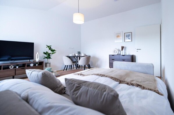 Apartamento, 2 camas de matrimonio | 2 dormitorios, wifi gratis, ropa de cama