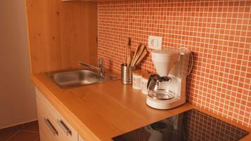 Fridge, microwave, coffee/tea maker, toaster