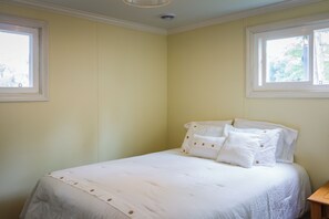 2 bedrooms, down comforters, laptop workspace, iron/ironing board
