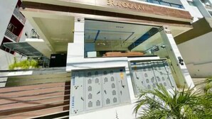 A modern building with a sign reading "BRANDON XVII".
