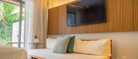 Deluxe Double Room | Living area | 42-inch LCD TV with cable channels