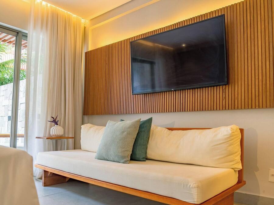Deluxe Double Room | Living area | 42-inch LCD TV with cable channels
