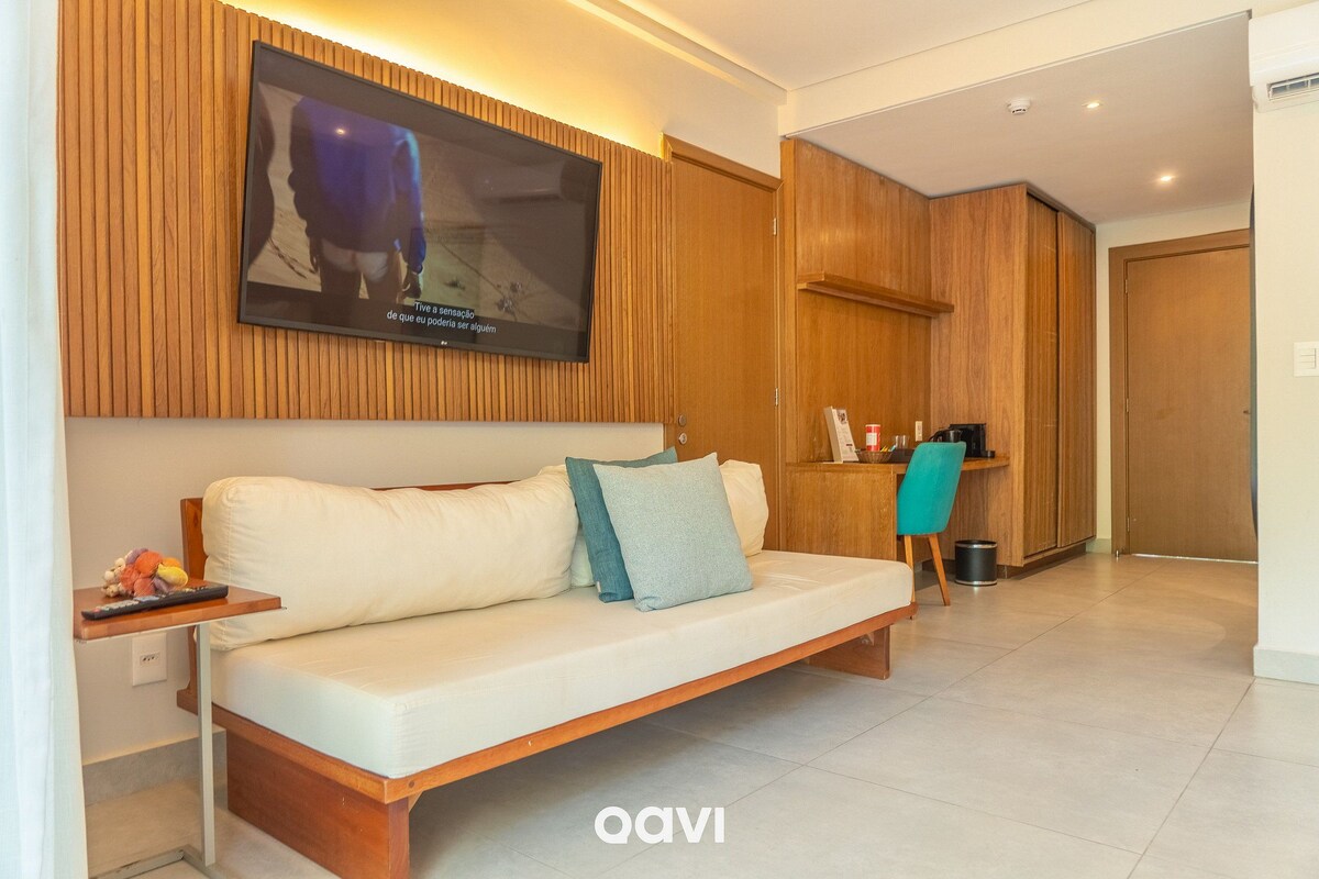Habitación Deluxe con 2 camas individuales | Zona de estar | Televisión LCD de 42 pulgadas con canales por cable