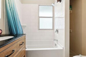 Hair dryer, towels, soap, shampoo