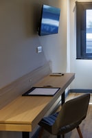 Standard Room, 1 Bedroom | In-room safe, desk, blackout drapes, iron/ironing board