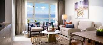 Sunny Condo, and Pool Opens to Beach Beyond