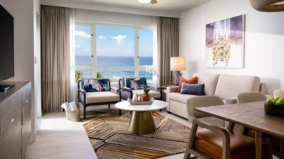 Sunny Condo, and Pool Opens to Beach Beyond