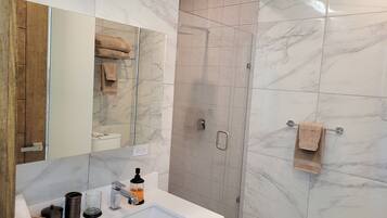 Condo | Bathroom | Shower, free toiletries, hair dryer, towels