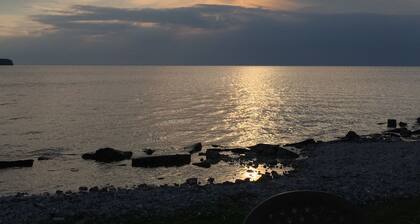 Water views from every window, covered porch & private deck, 7 min walk to beach