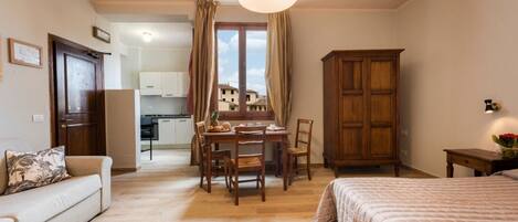 1 habitación, tabla de planchar con plancha, wifi y ropa de cama