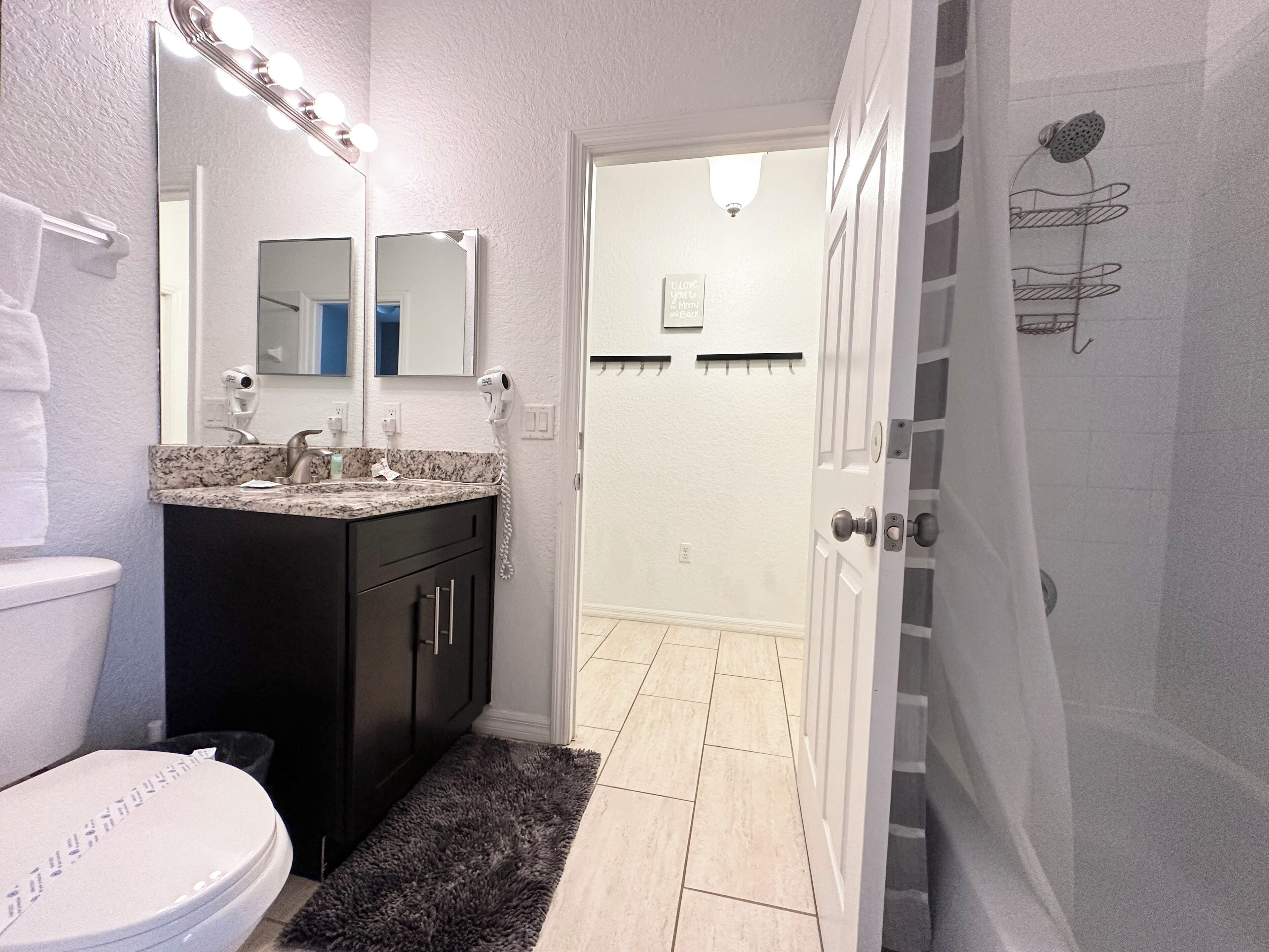 Hair dryer, towels, soap, toilet paper