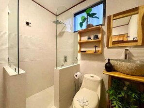 Shower, hair dryer, towels, soap