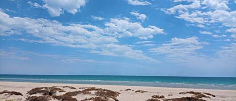On the beach, white sand