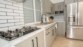 Fridge, microwave, coffee/tea maker, toaster