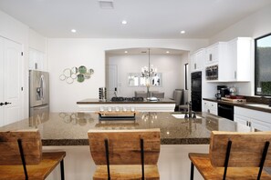 House | Private kitchen | Full-size fridge, microwave, oven, stovetop - Luxury Resort Style Living w/ Pool & Jacuzzi (Indio)