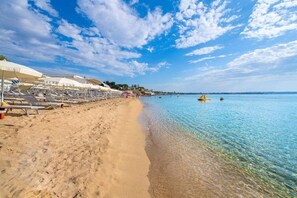 Sun loungers, beach towels - Syracuse sea (Arenella)