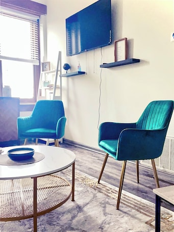 Dining. Downtown 2 bdr historic apartment w/ cinema room in Nulu