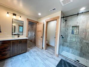 Shower, hair dryer, towels, soap