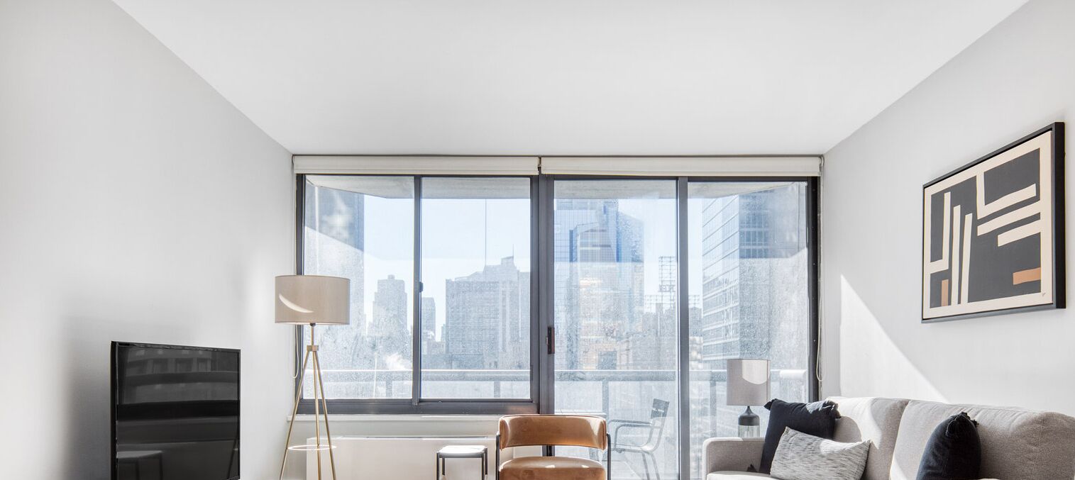 Classy Midtown 1BR w/ Doorman & Gym, Walk to Times Square, by Blueground