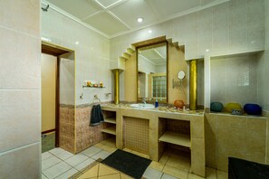 Bathtub, hair dryer, towels