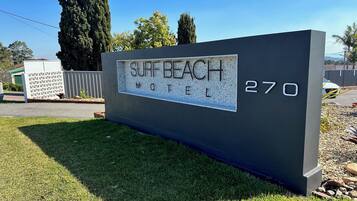 A sign for the Surf Beach Motel with the address 270.