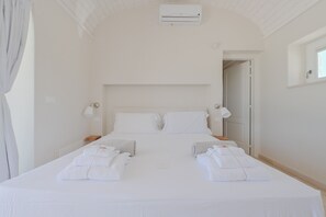 4 slaapkamers, een strijkplank/strijkijzer, gratis wifi, beddengoed