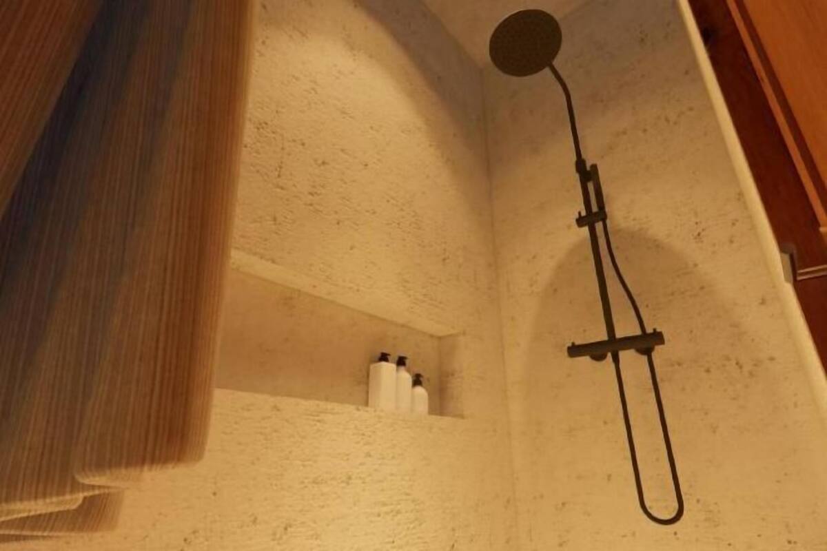 Bathroom | Shower, free toiletries, hair dryer, slippers