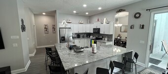 Modern and spacious getaway with a pool and grill