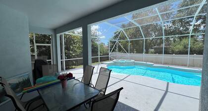 Modern and spacious getaway with a pool and grill