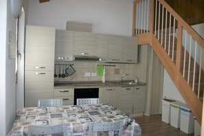 Private kitchen - 1 Bedroom Apartment in Loreto (Loreto)