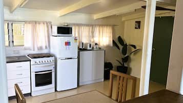 TeRitos Beachfront Villa | Private kitchen | Full-size fridge, microwave, toaster, cookware/dishes/utensils