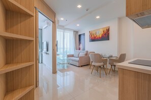 Apartamento superior | Área de estar | TV LCD