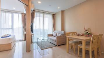 Deluxe Apartment | Living area | LCD TV