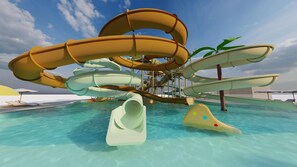 Sæsonbestemt udendørs pool, åben fra kl. 09.00 til kl. 19.00, parasoller