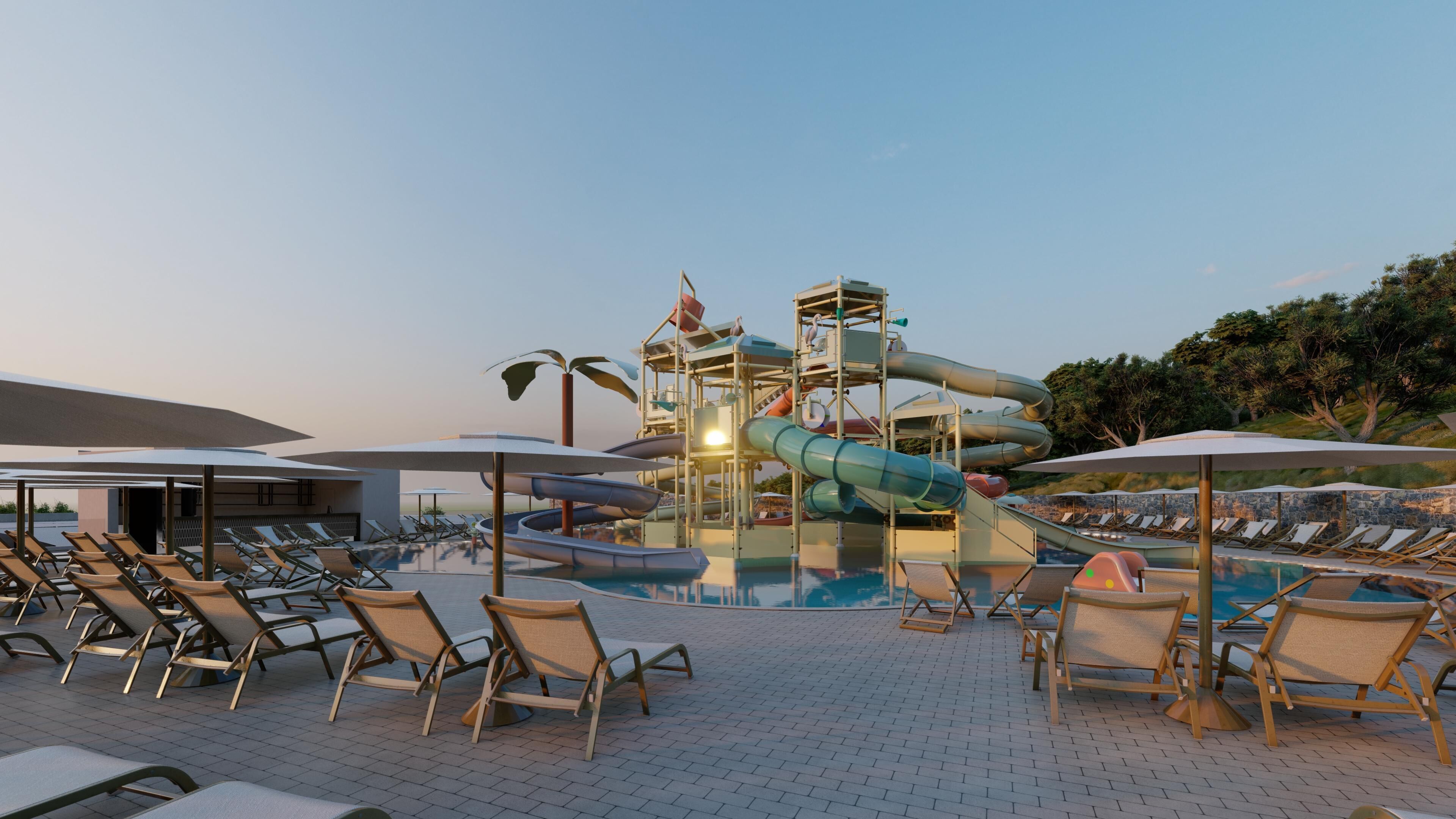 Ein Wasserpark mit mehreren Rutschen und einem Poolbereich mit Liegestühlen.