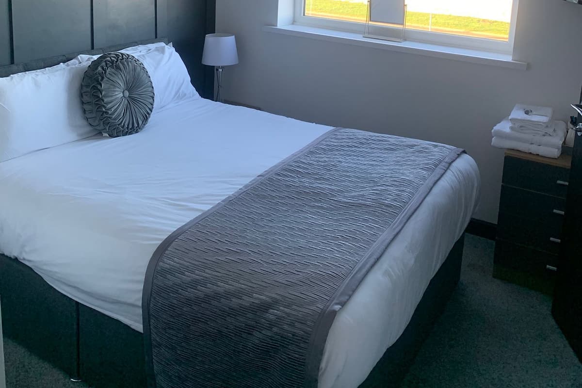 Standard dubbelrum - eget badrum - havsutsikt | 1 sovrum och strykjärn/strykbräda