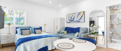 Iron/ironing board, travel crib, free WiFi, bed sheets