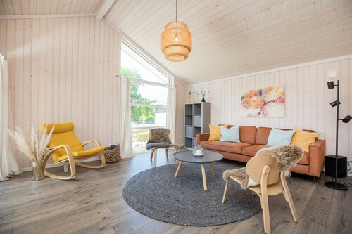 Behagliches Holzhaus mit Sauna im Skandi-Stil am Großen Zechliner See