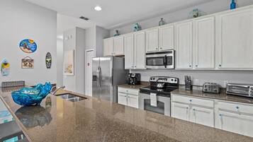 Microwave, dishwasher, coffee/tea maker, toaster