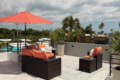 Luxury home with private pool steps from Black Eagle Beach