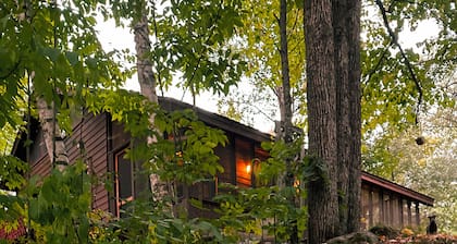 Secluded pet friendly cabin on 40 acres with frontage on the Kettle River