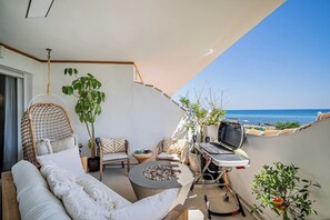 Terrace/patio - Luxury 2 bedroom beachfront apt in Bali-Boho style (Mijas Costa)