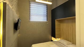 1 slaapkamer, een strijkplank/strijkijzer, wifi, beddengoed