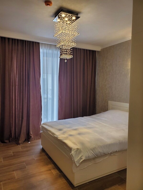 1 غرفة نوم وواي فاي وملاءات أسرّة