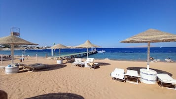 Sun-loungers, beach towels