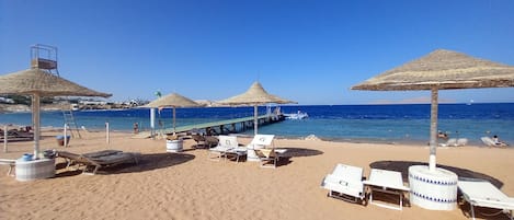 Sun-loungers, beach towels