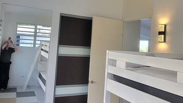 4 bedrooms, desk, iron/ironing board, travel cot