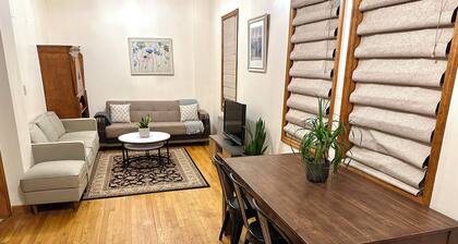 Quiet oasis w/ parking & yard; close to subway, restaurants, etc.