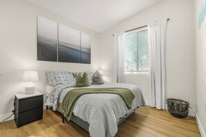 2 bedrooms, desk, iron/ironing board, travel crib