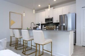 Fridge, microwave, stovetop, dishwasher - 4BR Townhome w/ Pool | Storey Lake (Kissimmee)